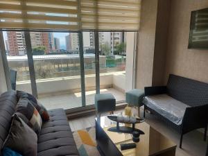 Posedenie v ubytovaní Edificio Medano Con Con