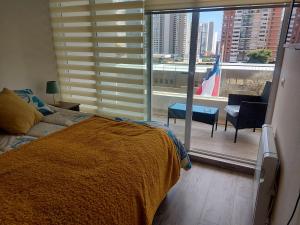 Posteľ alebo postele v izbe v ubytovaní Edificio Medano Con Con + 37 fotografií