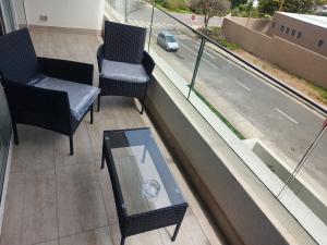 Posedenie v ubytovaní Edificio Medano Con Con