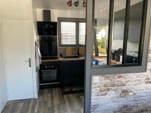 Dapur atau dapur kecil di Gîte zooval 9 personnes, piscine, à 5 min du zoo de Beauval