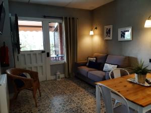 A seating area at Apartamentos El Llanin