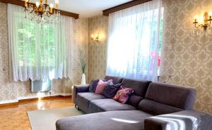 Posezení v ubytování Le Gîte de l'Ecureuil