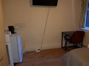 En tv och/eller ett underhållningssystem på BlackBerry rooms self-catering