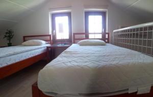 Ένα ή περισσότερα κρεβάτια σε δωμάτιο στο BRSUDA apartment 2/18 +8 φωτογραφίες