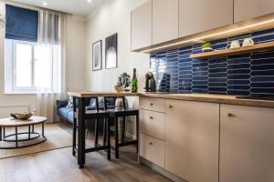 Kuchyňa alebo kuchynka v ubytovaní Sweet Dream Apartman