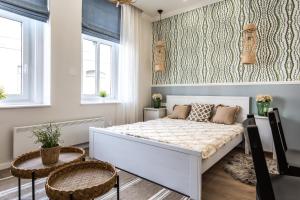Posteľ alebo postele v izbe v ubytovaní Sweet Dream Apartman