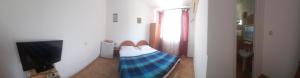 TV a/nebo společenská místnost v ubytování casa andrei m + 22 fotografií