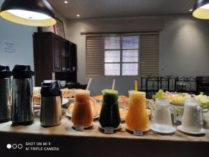 Nápoje v ubytování Hotel Pousada Calliandra
