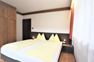 Posteľ alebo postele v izbe v ubytovaní Residence Tantalus