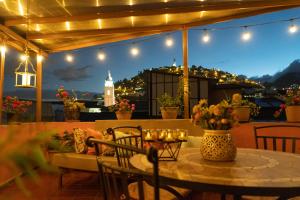 Rõdu või terrass majutusasutuses Rincón Familiar Hostel Boutique