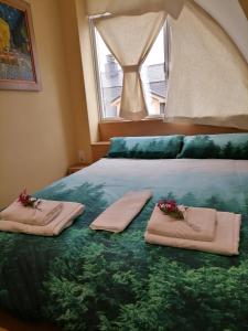 A bed or beds in a room at Ático Anllóns