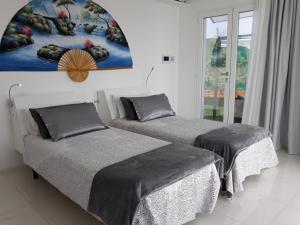 Posteľ alebo postele v izbe v ubytovaní Villa Luxury Paradise Suites
