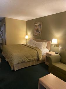Ένα ή περισσότερα κρεβάτια σε δωμάτιο στο Americas Best Value Inn (Meridian) +15 φωτογραφίες