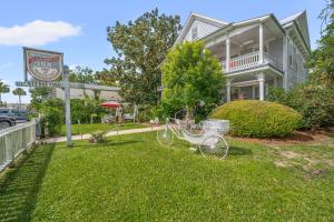 a bike parked in the yard of a house at Goodbread House Bed and Breakfast in Saint Marys