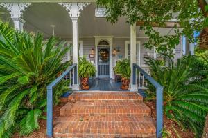 a house with stairs leading to the front door at Goodbread House Bed and Breakfast in Saint Marys