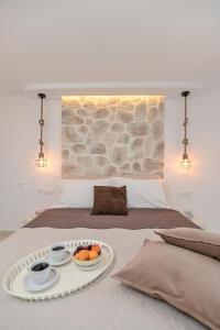 Posteľ alebo postele v izbe v ubytovaní Geolenas Home - Naxian Old Agora