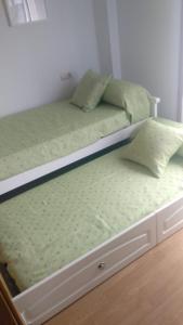 Posteľ alebo postele v izbe v ubytovaní apartamento melide