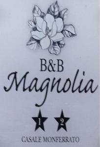 ein Zeichen für einen bbc maymite mit einer Blume und Sternen in der Unterkunft Magnolia in Casale Monferrato