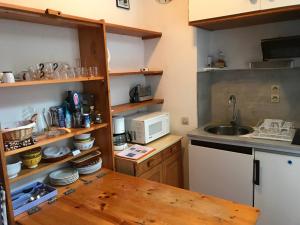 Køkken eller tekøkken på Vacances Perennes rue Richelieu + 5 billeder