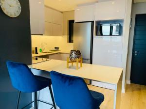 Una cocina o zona de cocina en Urban Elephant 16 On Bree