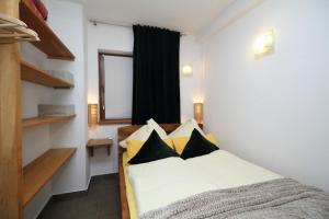 Postel nebo postele na pokoji v ubytování Lux & SPA Apartmani Zimski San