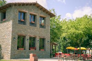 Κήπος έξω από το CAMPING SÈNIA RUPIT