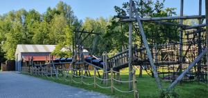 a playground with a slide in a park at Sweetlake in Zoetermeer