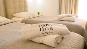 Cama o camas de una habitación en Carolina Hotel since 1934