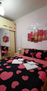 Postel nebo postele na pokoji v ubytování Apart-otel Nino
