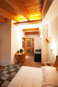 Postel nebo postele na pokoji v ubytování Garnì Astoria Hotel & SPA