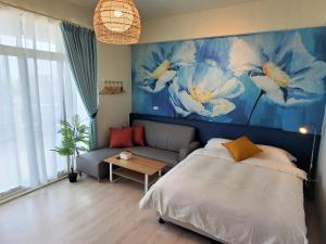 Postel nebo postele na pokoji v ubytování Touchai Life Guest House
