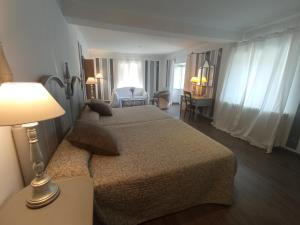 Cama o camas de una habitación en Hosteria de Arnuero