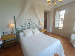 Cama o camas de una habitación en Hosteria de Arnuero