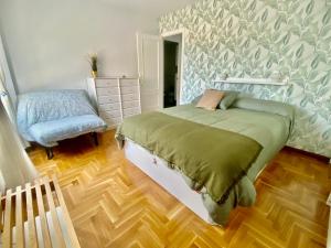 Postel nebo postele na pokoji v ubytování Apartamento La Caridad
