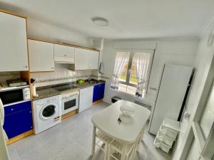 Kuchyň nebo kuchyňský kout v ubytování Apartamento La Caridad