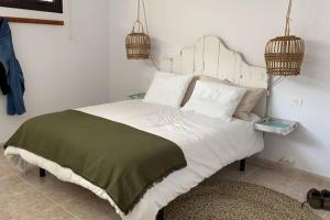 A bed or beds in a room at VILLA LÍA