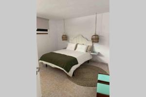 A bed or beds in a room at VILLA LÍA