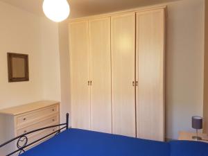 Łóżko lub łóżka w pokoju w obiekcie CASAVACANZA - Marina