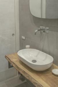 A bathroom at Green House Morin - San Pietro