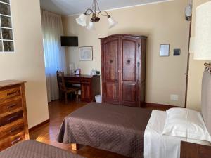 Postel nebo postele na pokoji v ubytování La Via del Sole
