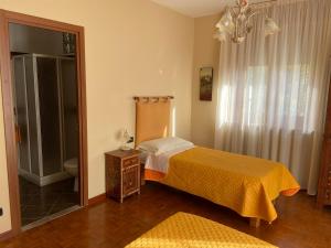 Postel nebo postele na pokoji v ubytování La Via del Sole