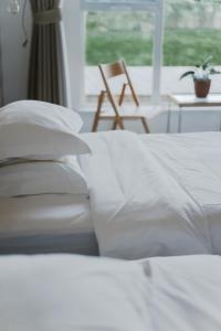 Letto o letti in una camera di 峨眉山一方民宿Mount Emei Little Place Guesthous