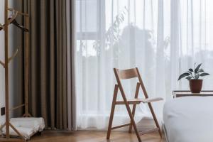 Letto o letti in una camera di 峨眉山一方民宿Mount Emei Little Place Guesthous