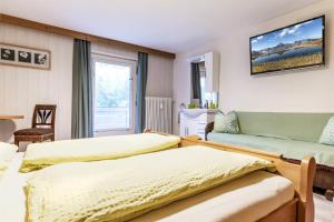 Letto o letti in una camera di Haus Ruepp