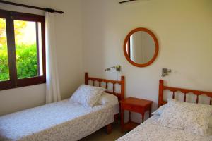 A bed or beds in a room at Villa Celia Még 18 kép