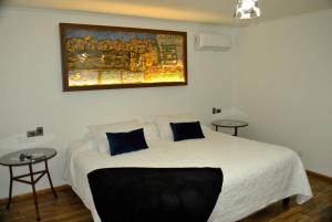 Postel nebo postele na pokoji v ubytování Hotel Boutique Casona Violeta