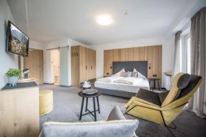 Postel nebo postele na pokoji v ubytování Hotel Walter