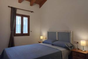 Posteľ alebo postele v izbe v ubytovaní Casa Escola