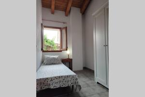 Posteľ alebo postele v izbe v ubytovaní Casa Escola