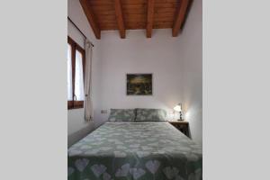 Posteľ alebo postele v izbe v ubytovaní Casa Escola